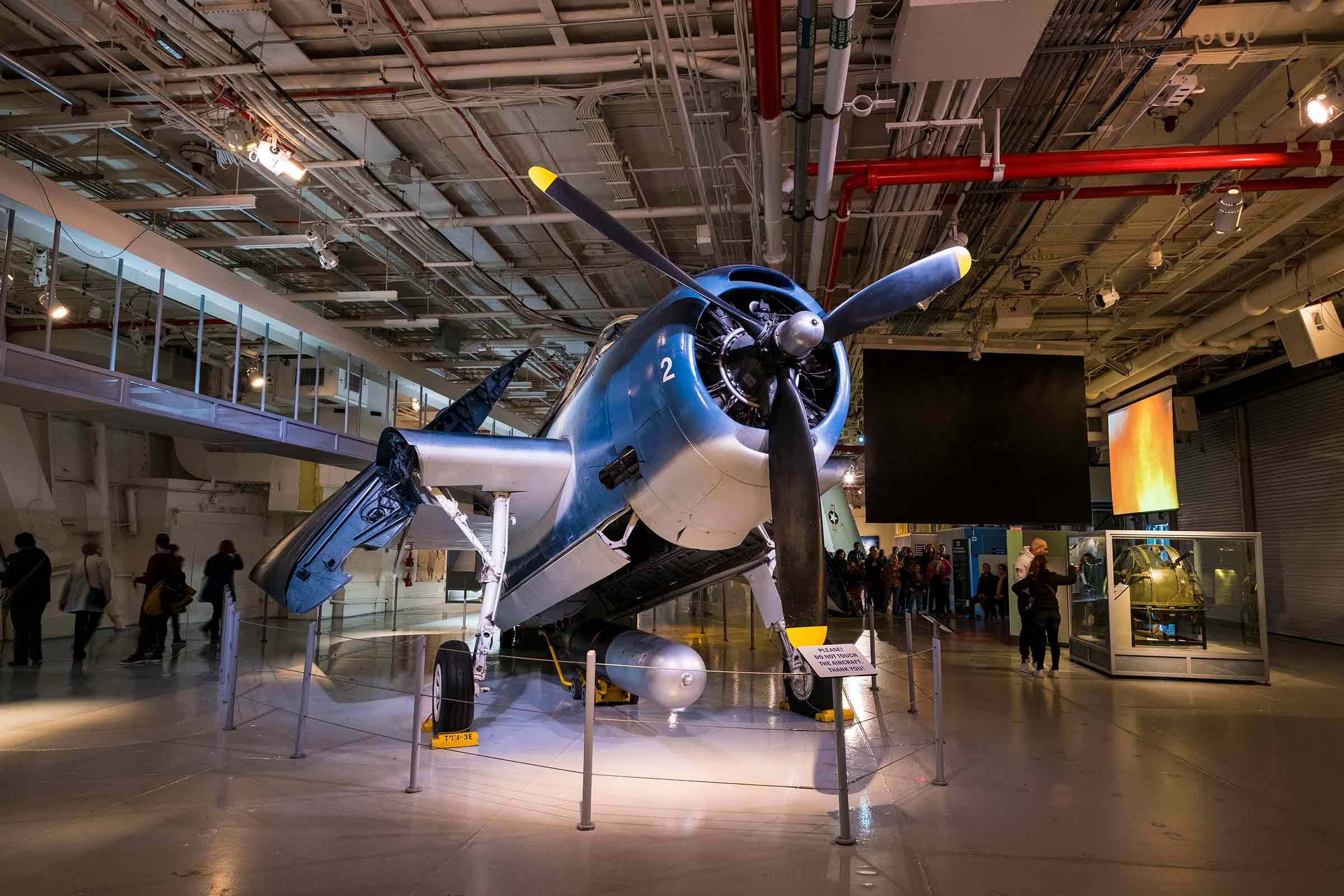 Propeller-powered airplane on display at the Intrepid Sea, Air & Space Museum